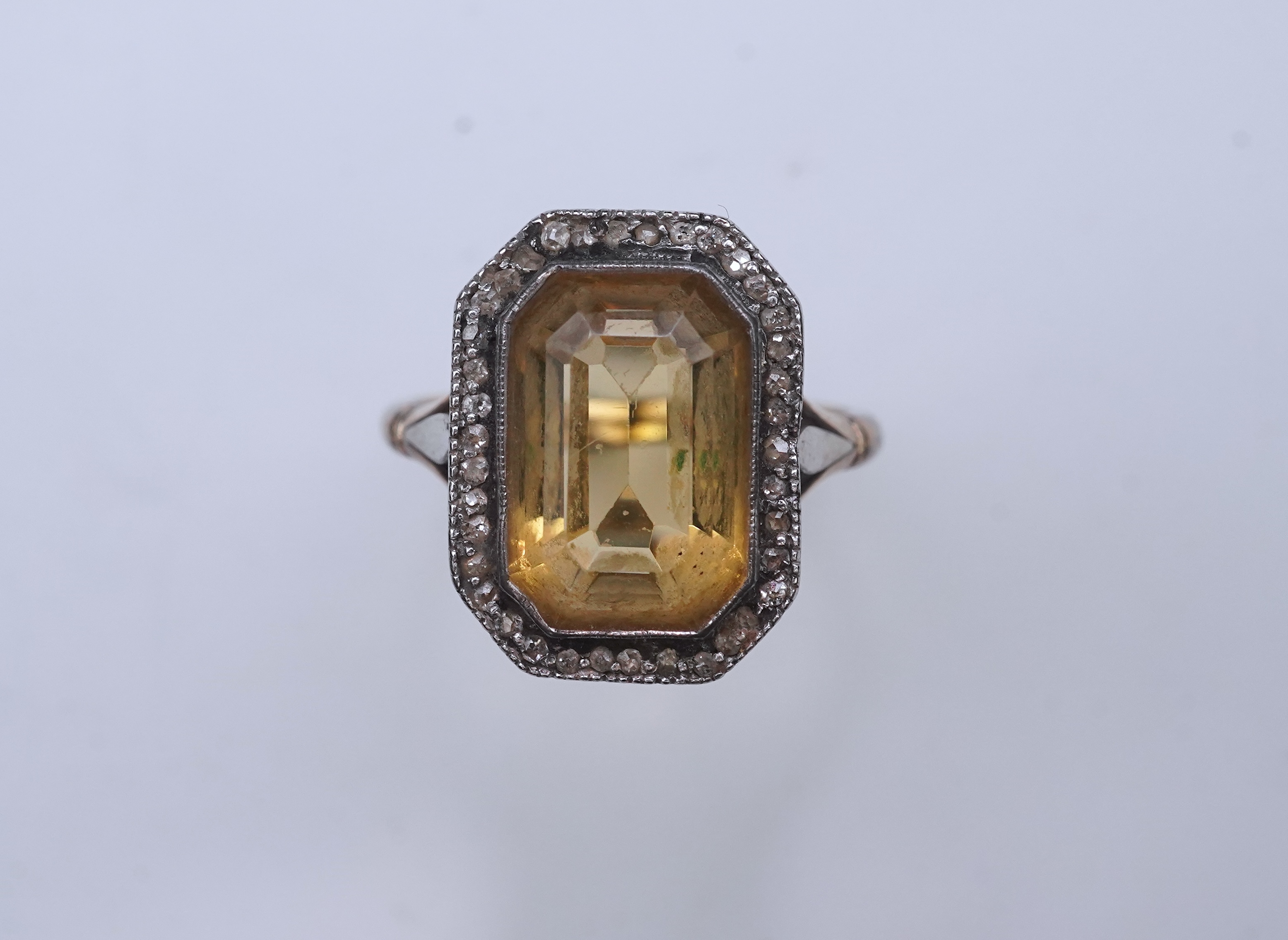 A citrine and diamond ring, early 20th century